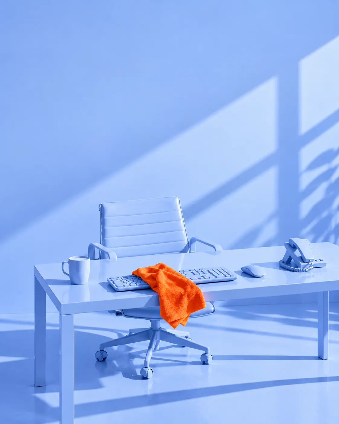 Powder-blue desk set with one orange microfibre cloth